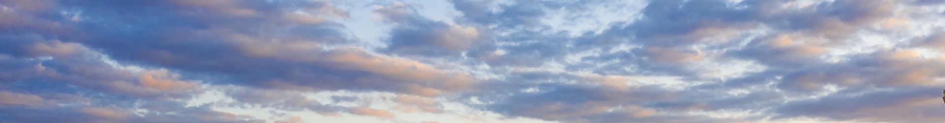 Landscape photograph of multiple cloud formations