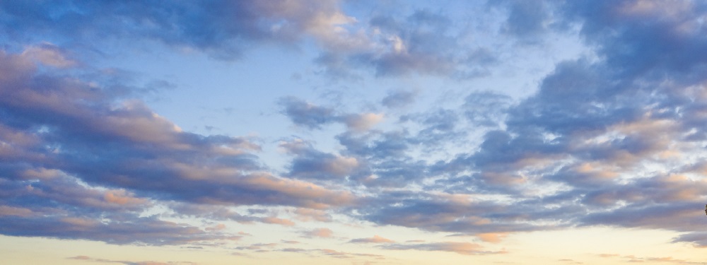 Landscape photograph of multiple cloud formations