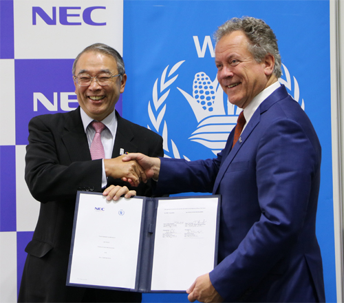 (from left to right): Nobuhiro Endo, Chairman of the Board, NEC Corporation and David M. Beasley, Executive Director, WFP